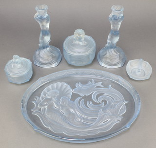 An Art Deco blue glass dressing table set