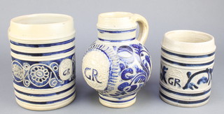 A German 2 colour glazed mug 6", a ditto 7" and a baluster jug 7" 