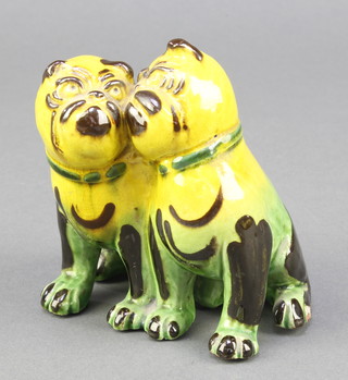 A glazed group of 2 seated dogs 3 1/2" 