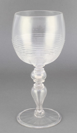 A 19th Century wine glass with ribbed bowl, the hollow stem with an 1887 3p, with fold over foot 8 1/2" 