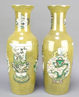 A pair of 18th Century style Chinese vases, the mottled ground decorated with vases 18", bearing 6 character marks