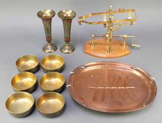 A Wanzer patent oval copper meat plate 14 1/2", a mahogany and brass wine bottle cradle, a pair of Benares brass trumpet shaped vases 8", 6 circular Benares brass dishes 4 1/2" 