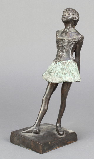 A bronze figure of a standing ballet dancer on a square base 9 1/2" 