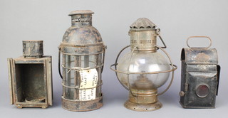 A 19th Century cylindrical iron and glass candle lantern 13"h (some corrosion) a 19th Century circular copper and glass lantern 12", a coaching lantern and a Benetfink "dark room" lamp 