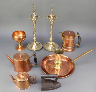A Bavarian copper and brass 3 pint "coffee" pot, the base marked GBN Bavaria 7", an oval copper teapot 9177 5" and 1 other circular copper teapot 3", copper frying pan with brass handle 9", a copper tray 11 1/2", ditto goblet, brass ashtray 18" and a flat iron 