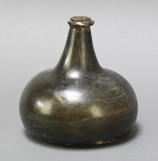 A 17th/18th Century dark green glass onion shaped wine bottle 6" 