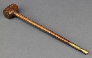 A curious 19th Century turned wooden and brass mounted gavel, the base incorporating a corkscrew, possibly for use in the licenced trade, 11 1/2"  