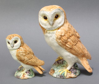 A Beswick figure of an owl, impressed  Beswick 1046 7" together with 1 other impressed 2026 5" 
