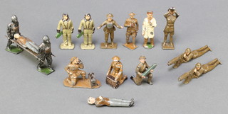 2 Britains figures of airmen 2", 2 machine gunners, stretcher bearer and stretcher with casualty, field telephonist (f), radio operator, artillery loader (head f), casualty, observer (steel helmet damaged) doctor and officer  