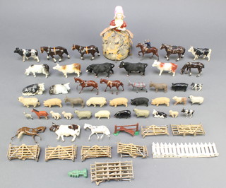 A collection of Britains figures of farmyard animals and fencing 