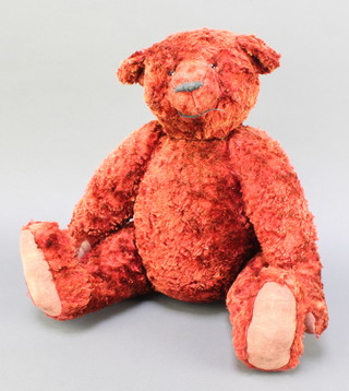 A red mohair teddybear with glass eyes hump and articulated limbs 19" 