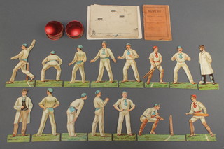 A Raphael Tuck & Sons table cricket game comprising floor plan, 2 batsmen, 11 fielders (bowlers hands f), 2 umpires and 46 balls 