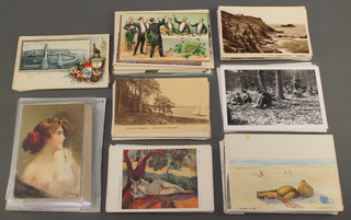 A quantity of various coloured postcards