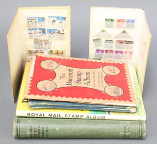 A Royal Mail album of World stamps, a New Empire album of World stamps, a Welcome illustrated album of World stamps, a Bancroft album of World stamps and 2 stock books of used World stamps 