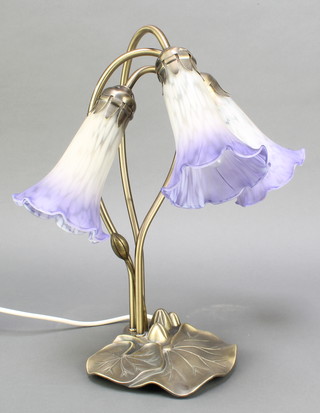 An Art Nouveau style bronze 3 light table lamp in the form of lilies with purple shades 17" 