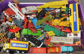 A collection of toy cars, play worn 