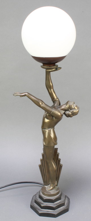 An Art Deco style bronzed table lamp in the form of a standing girl with outstretched hand 19" 