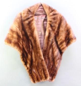 A lady's mink fur stole and 1 other 