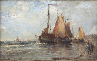 Edwin Hayes, oil on board, signed bottom to the bottom right hand corner, study of Dutch boats ashore with fishermen in the foreground, contained in a gilt frame  5.5" x 8 1/2"  