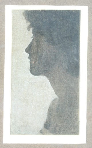 A monochrome silhouette print, profile of a lady, 7" x 3" in an oak frame 
