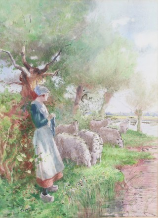Hutton Mitchell, watercolour drawing, standing lady with sheep by a river, signed to bottom left hand corner, 19 1/2"h x 14"h