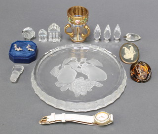 A miniature Bohemian glass 3 handled tyg 2", a Val Saint Lambert circular etched glass plaque decorated fruit 5 1/2", 3 Swarovski pineapples 1" (1 with slight chip to top), 2 ditto models of houses 1" and 1 1/2" etc