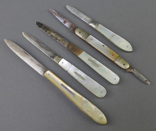 Four silver and mother of pearl fruit knives and 1 other