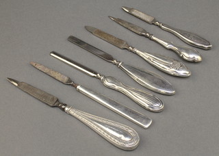 Seven silver handled manicure implements
