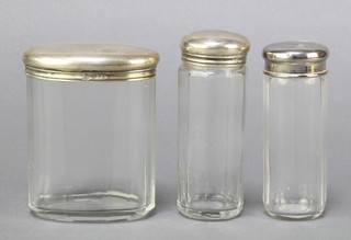 2 circular panel cut glass pin jars and covers with silver lids 3 1/2" and an oval ditto 3 1/2" (slight chip to rim) 