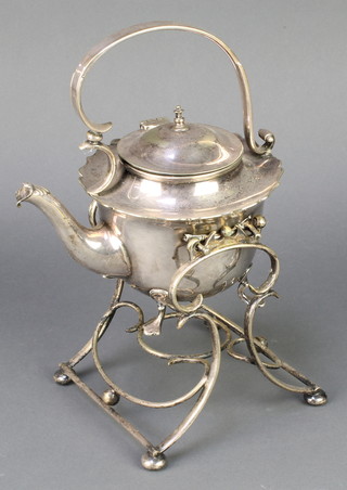 An Edwardian silver plated tea kettle on stand 