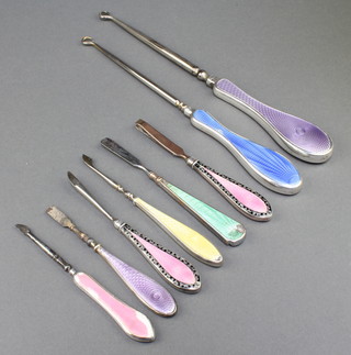 Six silver and guilloche enamel implements