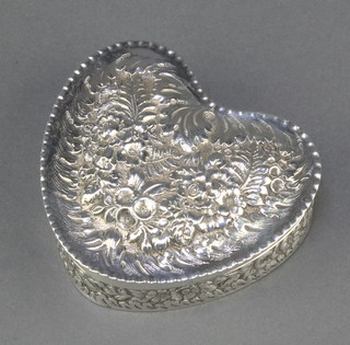 A Tiffany Sterling silver heart shaped trinket box  with floral decoration 140 grams 3 1/2" 