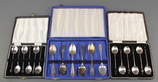 A cased set of 6 silver teaspoons, Sheffield 1946 82 grams, a cased set of 6 bean end coffee spoons Birmingham 1926 and a cased set of plated ditto