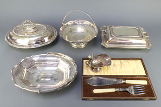A silver plated entree set and minor plated items