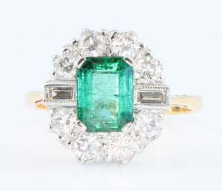 An 18ct yellow gold emerald and diamond cluster ring, the centre stone approx. 1.85ct, surrounded by diamonds approx. 1.01ct, size O 1/2