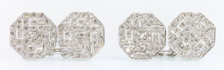 A pair of white gold pave diamond set octagonal cufflinks, approx. 1.50ct