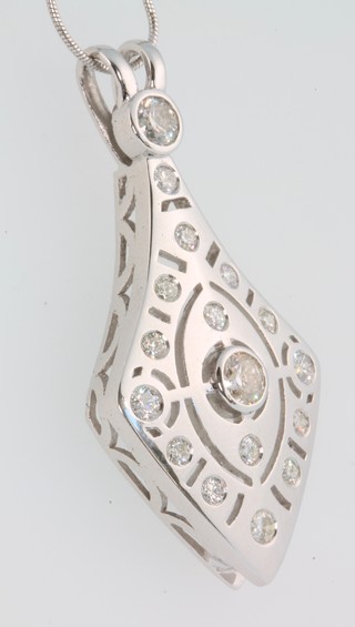 An 18ct white gold diamond set, free form pendant, on a ditto 18ct gold chain 1.96ct 