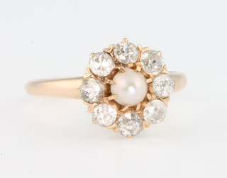 A yellow gold pearl and 8 stone diamond cluster ring, size M 