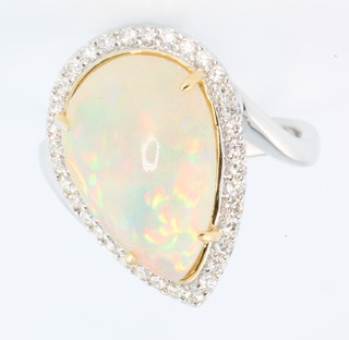 An 18ct white gold opal and diamond pear shaped cluster ring, size M 1/2 