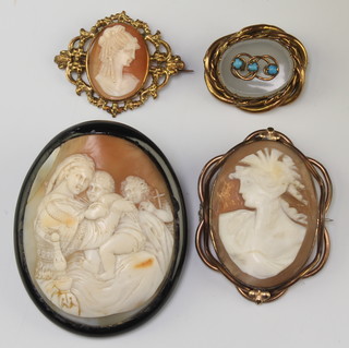 A Victorian carved cameo brooch of a biblical scene 2 other cameo brooches and a hardstone ditto 
