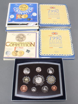 A 2000 proof coin set and 3 uncirculated coin sets