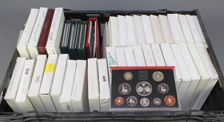 Thirty nine mixed date proof coins sets