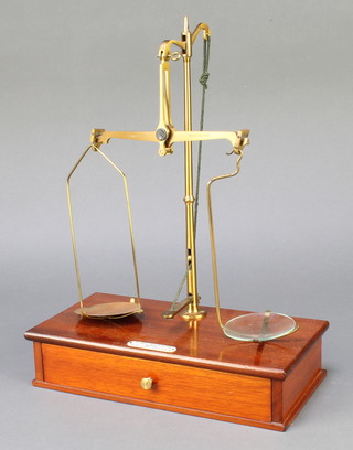 D E Graves Short & Company Ltd, a mahogany and brass class B balance the base fitted a drawer with 13 weights
