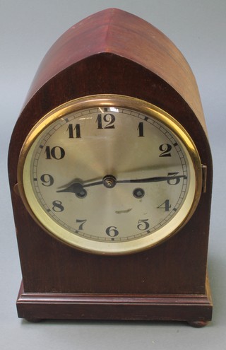 An Edwardian striking bracket clock with silvered dial and arabic numerals contained in a mahogany lancet case 12"
