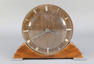 Davall, an Art Deco mantel timepiece with Roman numerals, contained in a walnut case 