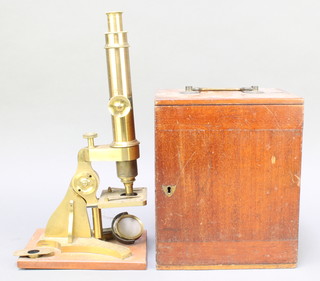 Watson & Sons, 313 High Holborn London, a student's brass single pillar microscope complete with carrying case 