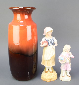 A Scheurich-Keramik West German brown and red glazed Art Pottery vase 239-41 16" and 2 19th Century biscuit porcelain figures of standing girls 12" and 8" 