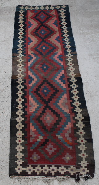 An Afghan blue and red ground Kilim runner 118" x 36"