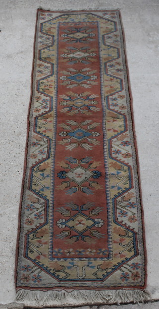 A Caucasian style runner with 7 diamonds to the centre 109" x 34"