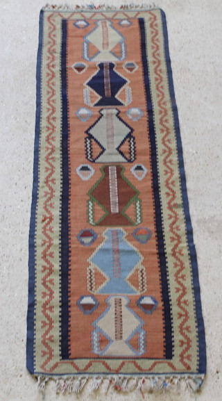 A Kilim runner with 6 stylised urns to the centre 83" x 27 1/2"